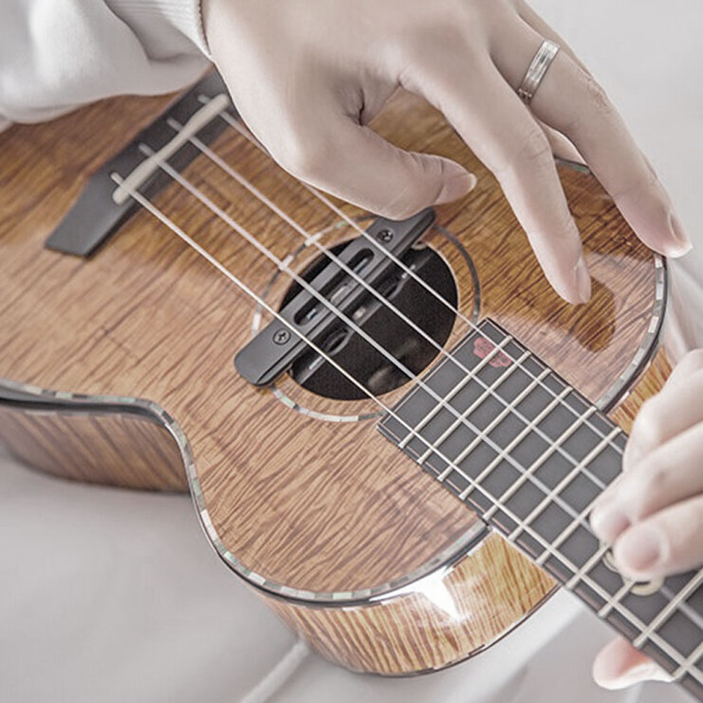Как использовать звукосниматель укулеле? Установка, настройка и уход